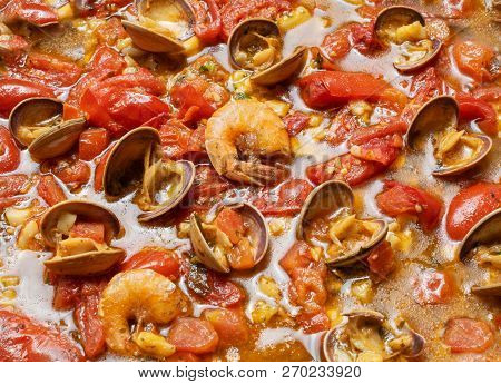 Shrimp In A Tomato Sauce With Mollusks. Italian Cuisine. Seafood Closeup View. Stock Image.