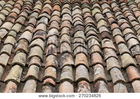 Old Red Tiles Roof. Closeup Top View Background. Stock Image.