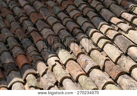 Old Red Tiles Roof. Closeup Top View Background. Stock Image.