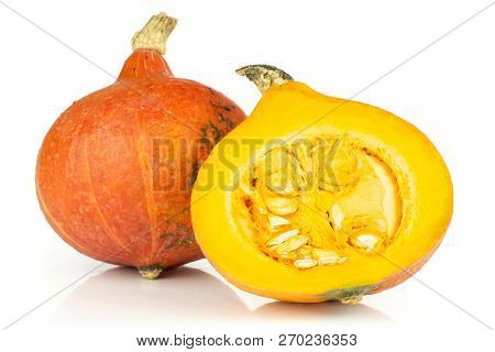 Group Of One Whole One Half Of Fresh Red Kuri Pumpkin Hokkaido Variety Fresh Cut Section With Seeds 