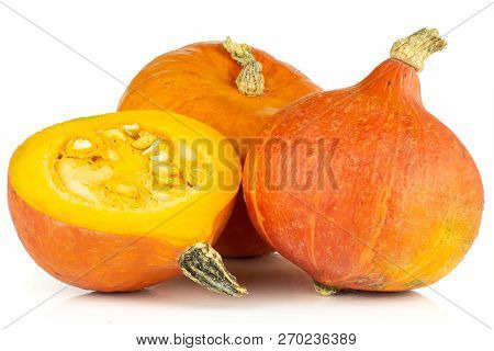 Group Of Two Whole One Half Of Raw Fresh Red Kuri Pumpkin Hokkaido Variety Isolated On White Backgro