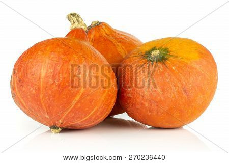 Group Of Three Whole Raw Fresh Red Kuri Pumpkin Hokkaido Variety Isolated On White Background