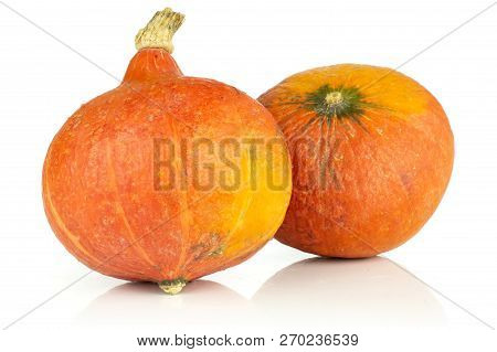 Group Of Two Whole Raw Fresh Red Kuri Pumpkin Hokkaido Variety Isolated On White Background
