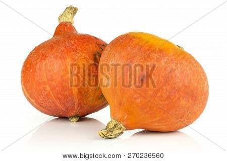 Group Of Two Whole Teardrop Shaped Fresh Red Kuri Pumpkin Hokkaido Variety Isolated On White Backgro
