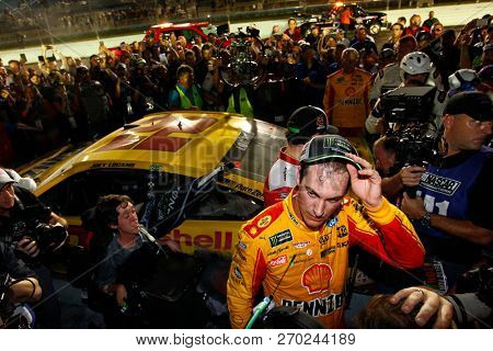 November 18, 2018 - Homestead, Florida, USA: Joey Logano (22) celebrates after winning the Monster Energy NASCAR Cup Series Championship after winning the Ford 400 at Homestead-Miami Speedway 