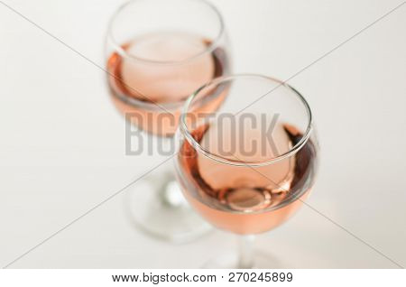 Transparent Glass Of Wine. Pink Wine. Festive Mood. Alcohol For A Group Of Friends. Delicious Drink.