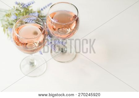 Transparent Glass Of Wine. Pink Wine. Festive Mood. Alcohol For A Group Of Friends. Delicious Drink.
