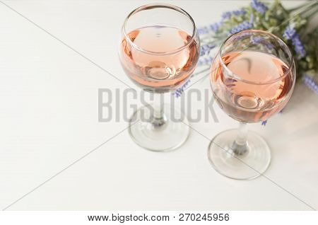 Transparent Glass Of Wine. Pink Wine. Festive Mood. Alcohol For A Group Of Friends. Delicious Drink.