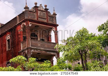 Old Weathered Buildings In Longhua District Of Shenzhen China Surrounded  By Trees.