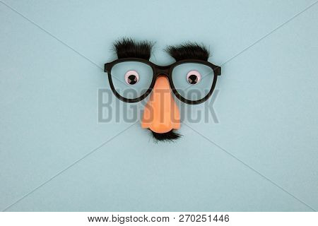Funny Mask With Eyes And Nose On Light Blue Background