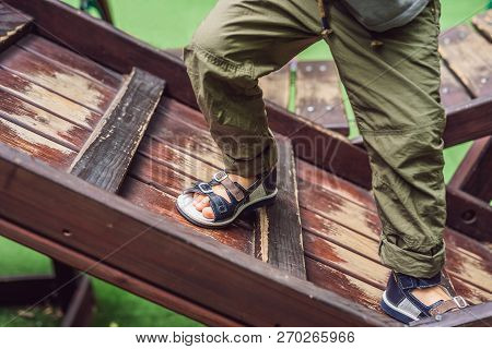 Childrens Orthopedic Shoes On The Boys Feet