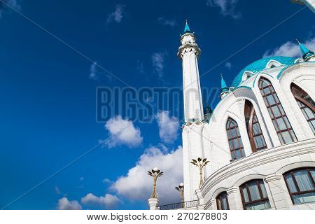 Minarets Of The Mosque Against The Blue Sky