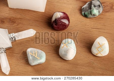 A Closeup Of Ancient Norse Runes, Stones With Symbols Used In Wicca And Other Magic And For Divinati