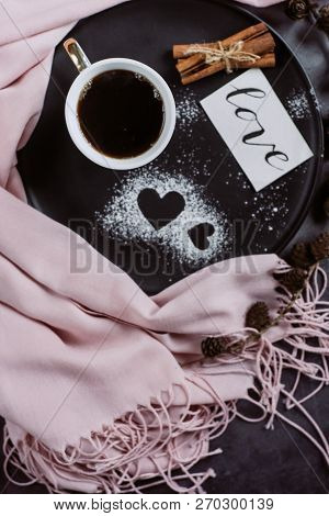 Valentines Day With Cup Of Coffee, Bumps,skarf, Cinnamon And Heart On Gray Table From Above In Flat 