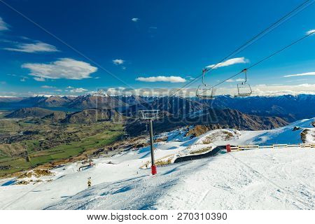 New Zealand mountain panorama and snow ski slopes as seen from Coronet Peak ski resort, Queenstown