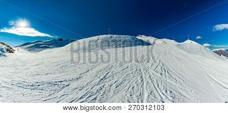 New Zealand mountain panorama and snow ski slopes as seen from Coronet Peak ski resort, Queenstown