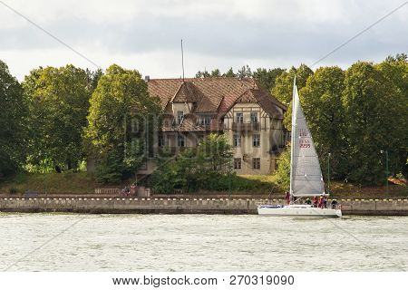 Klaipeda, Lithuania - September 22, 2018: Small Sail Yacht Are Sailing In The Waters Of The Curonian