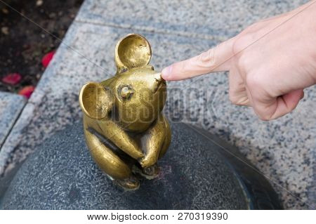 Klaipeda, Lithuania - September 22, 2018: Sculpture Known As Wonderful Little Mouse And Human Hand. 