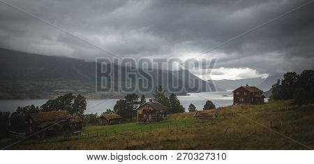 Small Settlement Above Gjevilvatnet Lake In Trollheimen Mountains, Norway.
