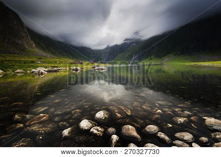 Mountain Lake Nedre Heimredalsvatnet Near Eggum Village In Lofoten Islands. Summer In Norway.