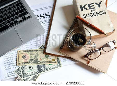 Business Concepts,key Of Success With Coffee  , Laptop And Dollas.