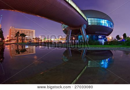 BANGKOK - SEP 25: Reflection of Government Sport Gymnasium shines at Dusk on Sep 25.2010 in Bangkok. Government Complex has 34 government units located at Chaeng Wattana Street in Bangkok.