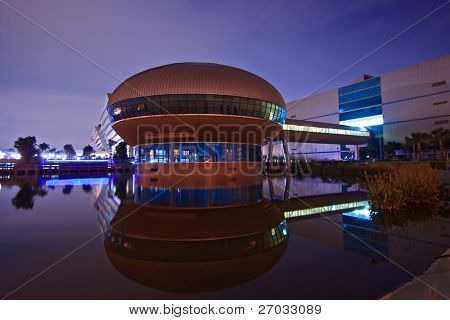 BANGKOK-SEP 25:Reflection of Government Sport Gymnasium shines at Dusk on Sep 25.2010 in Bangkok. Government Complex has 34 government units located at Chaeng Wattana Street in Bangkok.
