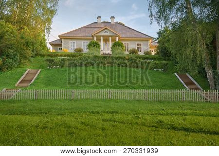 Pushkin Mountains, Stairs Leading To House Of The Poet On Background Blue Sky.