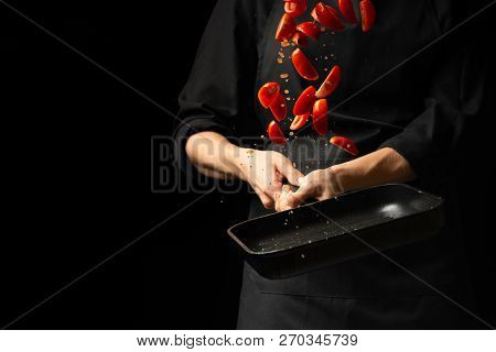 The Chef Prepares Tomato Sauce, Fry The Tomatoes, Cherry Tomatoes In A Frying Pan, Freeze, For Pasta