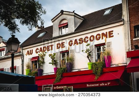 Paris, France - October 6, 2018: Front Of The Restaurant Au Cadet De Gascogne On The Place Du Tertre