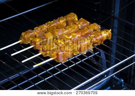 Spiced Pork Meat Skewers Just Before Baking On Oven. This Brochette Is Also Called In Spain Pincho M