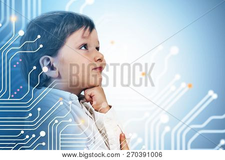 Side View Of Cute Little Boy Thinking Standing Near Gray Wall With Double Exposure Of Circuits. Futu