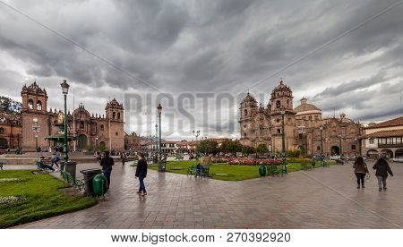 Cuzco, Peru - May 23, 2015:  Cathedral And La Compania De Jesus Church On Plaza De Armas Square In C
