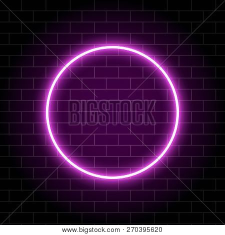 Neon Circle Lamp Isolated On Brick Wall. Pink Glowing Circle Bulb. Sparkling Circle Banner With Plac