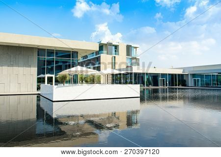 Ajman, United Arab Emirates - 30 October 2018: Landscape With Modern Design Buildings And Lagoon Poo