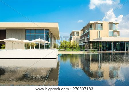 Ajman, United Arab Emirates - 30 October 2018: Landscape With Modern Design Buildings, Lagoon Pool A