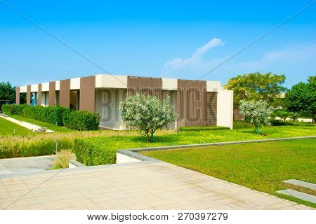 Ajman, United Arab Emirates - 30 October 2018: Landscape With Modern Design Villas And Garden In A L