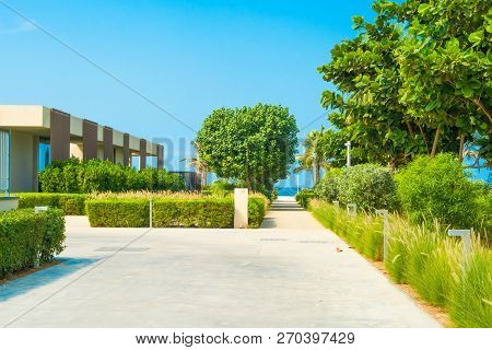 Ajman, United Arab Emirates - 30 October 2018: Landscape With Modern Design Villas And Garden In A L
