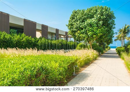 Ajman, United Arab Emirates - 30 October 2018: Landscape With Modern Design Villas And Garden In A L