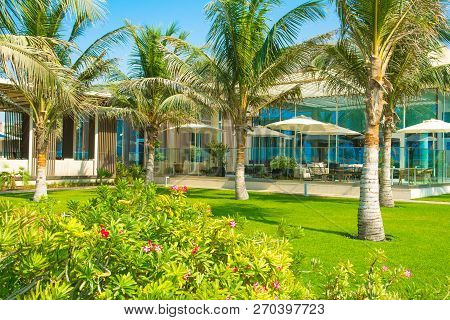 Ajman, United Arab Emirates - 30 October 2018: Landscape With Modern Design Restaurant Building And 