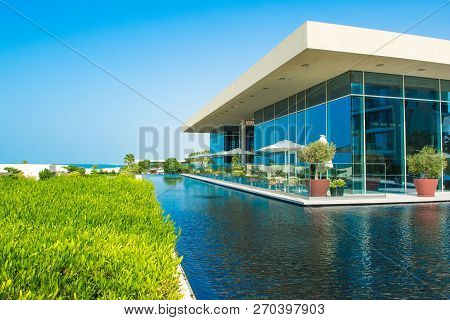 Ajman, United Arab Emirates - 30 October 2018: Landscape With Modern Design Buildings, Lagoon Pool A