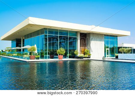 Ajman, United Arab Emirates - 30 October 2018: Landscape With Modern Design Buildings, Lagoon Pool A