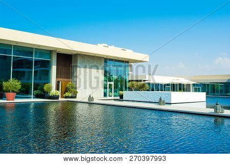 Ajman, United Arab Emirates - 30 October 2018: Landscape With Modern Design Buildings, Lagoon Pool A