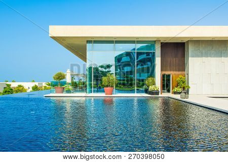 Ajman, United Arab Emirates - 30 October 2018: Landscape With Modern Design Buildings, Lagoon Pool A