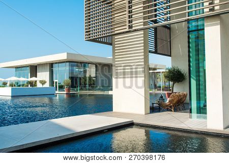 Ajman, United Arab Emirates - 30 October 2018: Landscape With Modern Design Buildings, Lagoon Pool A