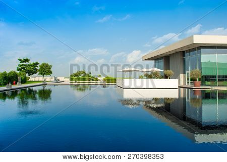 Ajman, United Arab Emirates - 30 October 2018: Landscape With Modern Design Buildings, Lagoon Pool A