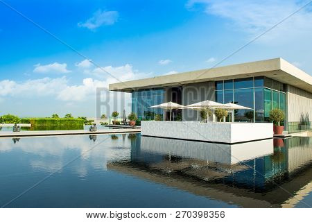 Ajman, United Arab Emirates - 30 October 2018: Landscape With Modern Design Buildings And Lagoon Poo