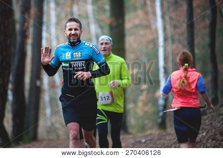 Czech Republic, Pilsen, November 2018: Hannah Pilsen Trail Krkavec. Runner Waving Into The Camera.