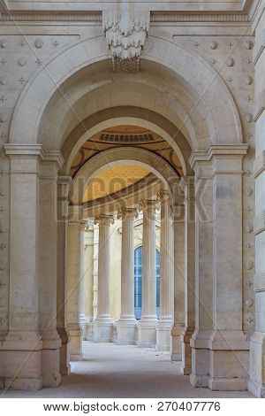 Classic Archway With A Perspective View Onto The Roman Style Colonnade At The Palais Longchamp In Ma