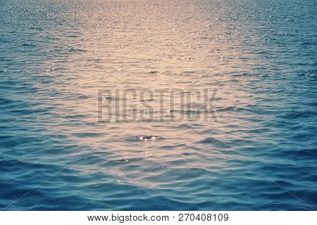 Sunset Time Over Blue Orange Black Sea Background